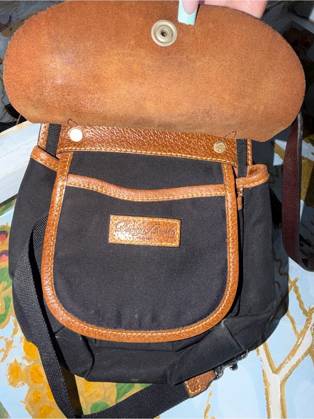 Authentic Dooney & Bourke Black canvas and genuine Leatherbag